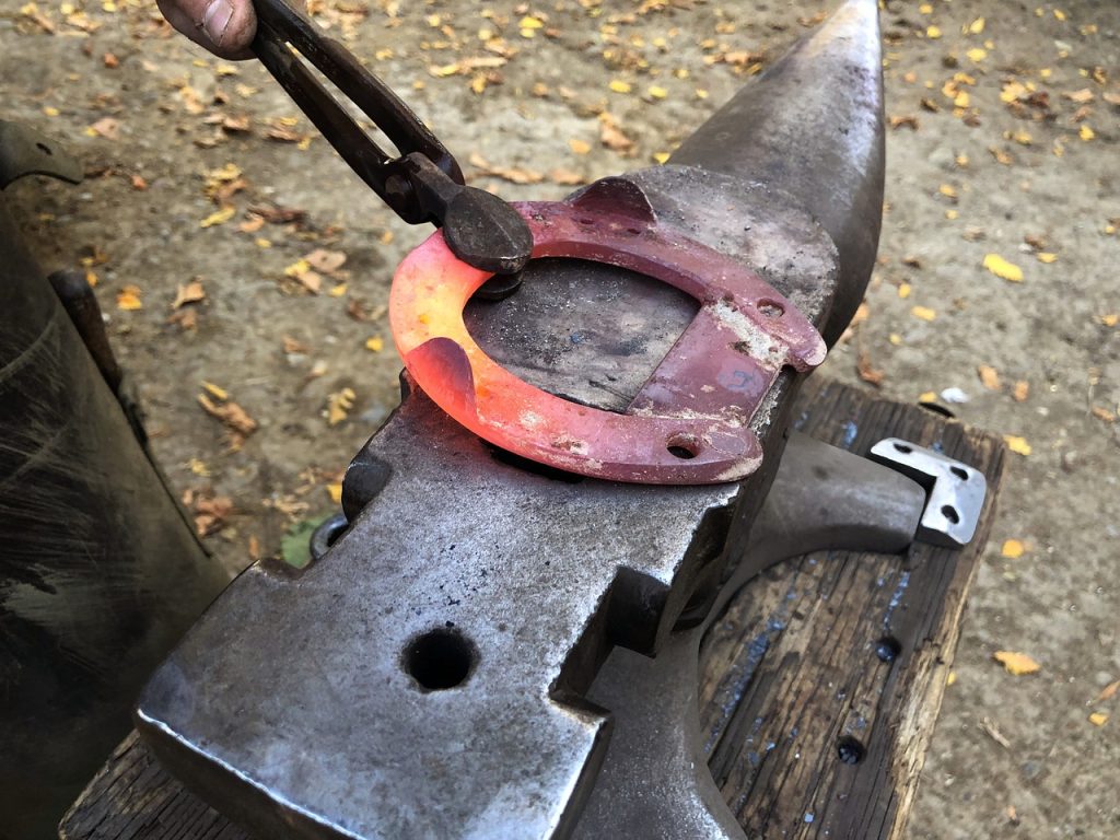 Blacksmith Forging Horse Hoof